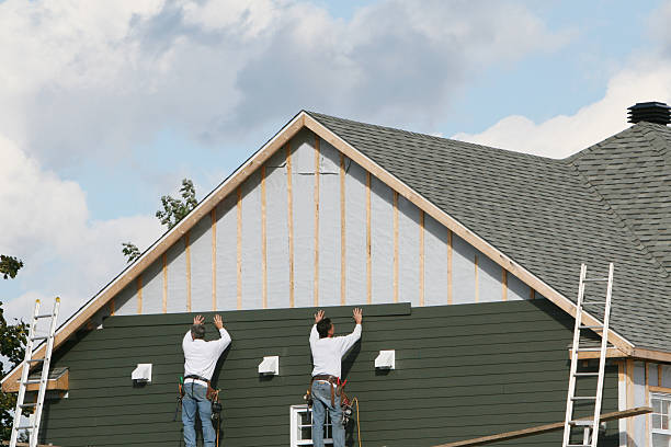 Professional Siding Replacement technician working in Madison, MD